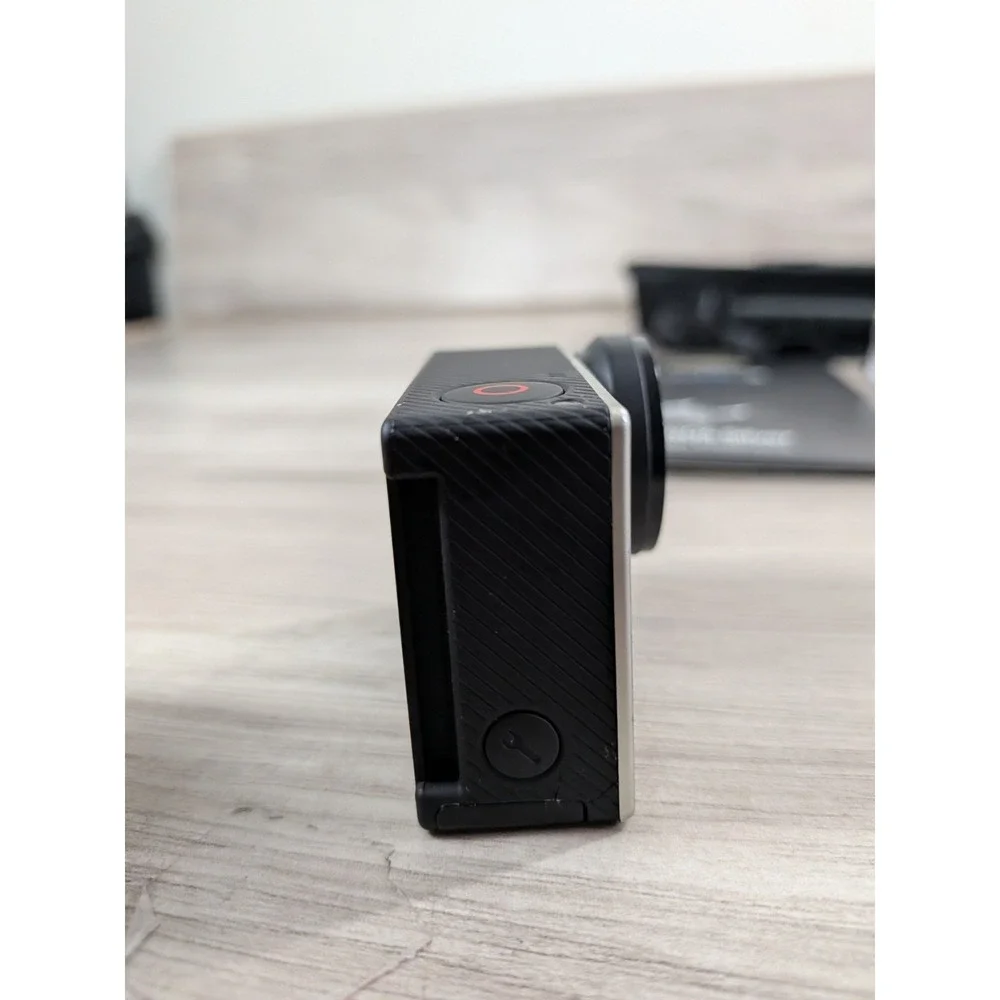 GoPro Hero 4 Silver Edition- with Accessories and Case Included